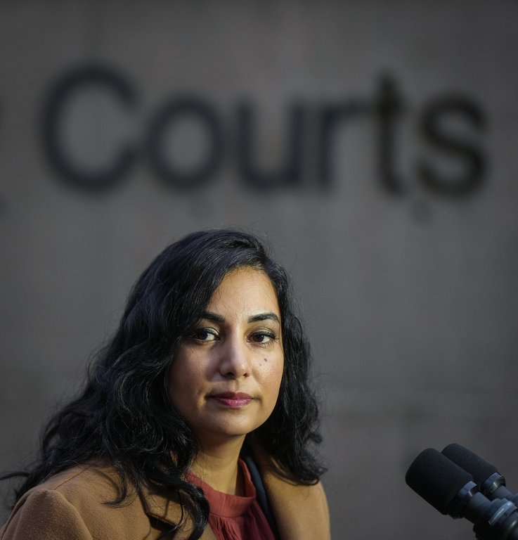B.C. Attorney General Niki Sharma pauses while responding to questions outside B.C. Supreme Court in Vancouver on Monday November 27, 2023. THE CANADIAN PRESS/Darryl Dyck