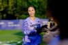 In this image provided Washington Athletics, Washington's goalkeeper Mia Hamant greets teammates before an NCAA college soccer game against Southern California, Sept. 12, 2024, in Seattle. (Scott Eklund, Red Box Pictures/Washington Athletics via AP)