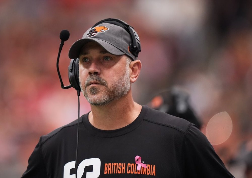 B.C. Lions head coach Buck Pierce walks on the sideline during the second half of a CFL football game against the Montreal Alouettes, in Vancouver, on Saturday, August 16, 2025. THE CANADIAN PRESS/Darryl Dyck