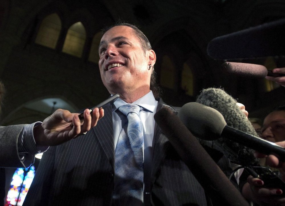 Senator Patrick Brazeau speaks to reporters as he arrives at the Senate on Parliament Hill on Tuesday, Sept. 27, 2016 in Ottawa. THE CANADIAN PRESS/Justin Tang