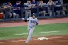 Los Angeles Dodgers' Shohei Ohtani rounds the bases after hitting a two run home run against the Toronto Blue Jays during the seventh inning in Game 1 of baseball's World Series, Friday, Oct. 24, 2025, in Toronto. (AP Photo/David J. Phillip)