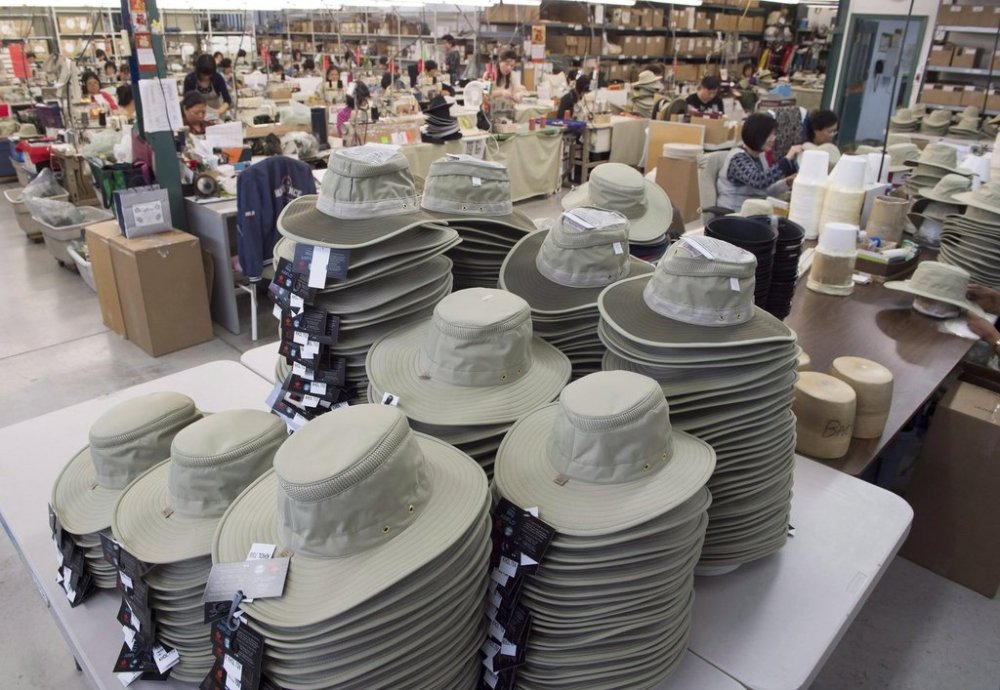 Finished hats sit in piles at the Tilley Endurables factory in Toronto on Thursday January 5, 2017. THE CANADIAN PRESS/Frank Gunn