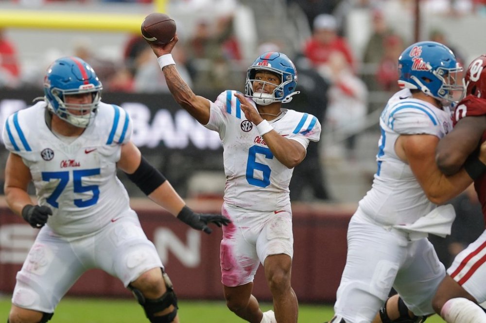 Mississippi quarterback Trinidad Chambliss (6) throws a pass during the first half of an NCAA college football game against Oklahoma in Norman, Okla., Saturday, Oct. 25, 2025. (AP Photo/Alonzo Adams)