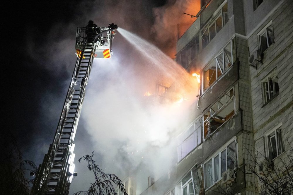 In this photo provided by the Ukrainian Emergency Service, emergency personnel work to extinguish a fire in Sumy, Ukraine, on Friday, Oct. 31, 2025, following Russian drone attacks. (Ukrainian Emergency Service via AP)