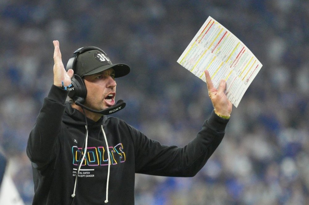 Indianapolis Colts head coach Shane Steichen signals a touchdown during the first half of an NFL football game against the Las Vegas Raiders, Sunday, Oct. 5, 2025, in Indianapolis. (AP Photo/AJ Mast)