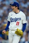 Los Angeles Dodgers pitcher Roki Sasaki celebrates their win against the Milwaukee Brewers in Game 3 of baseball's National League Championship Series, Thursday, Oct. 16, 2025, in Los Angeles. (AP Photo/Brynn Anderson)