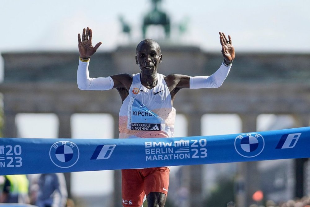 FILE - Kenya's Eliud Kipchoge crosses the line to win the men's division of the Berlin Marathon in Berlin, Germany, Sunday, Sept. 24, 2023. (AP Photo/Markus Schreiber, FILE_