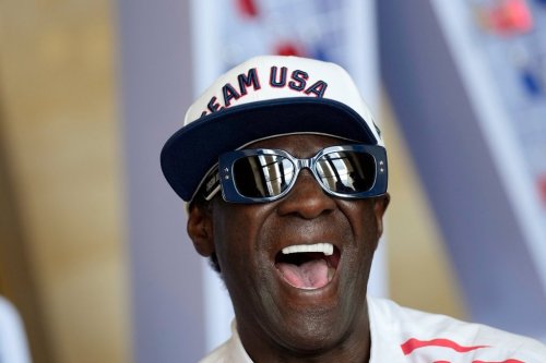 FILE - Flavor Flav laughs during an interview with The Associated Press at the USA house at the 2024 Summer Olympics, July 25, 2024, in Paris, France. (AP Photo/Luca Bruno, file)