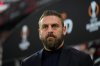 FILE - Then-Roma's head coach Daniele De Rossi waits for the start of the Europa League second leg semi-final soccer match between Leverkusen and Roma at the BayArena in Leverkusen, Germany, Thursday, May 9, 2024. (AP Photo/Matthias Schrader, File)