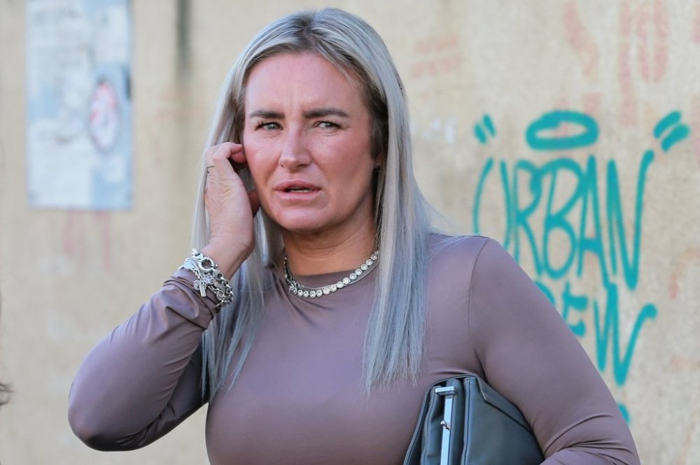 Lyanne Kennedy, the mother of 19-year-old Bella May Culley who was arrested upon arrival at the Tbilisi Airport in May and accused of attempting to smuggle marijuana and hashish into the country, arrives to attend a court session in Tbilisi, Georgia, Tuesday, Oct. 28, 2025. (AP Photo/Zurab Tsertsvadze)