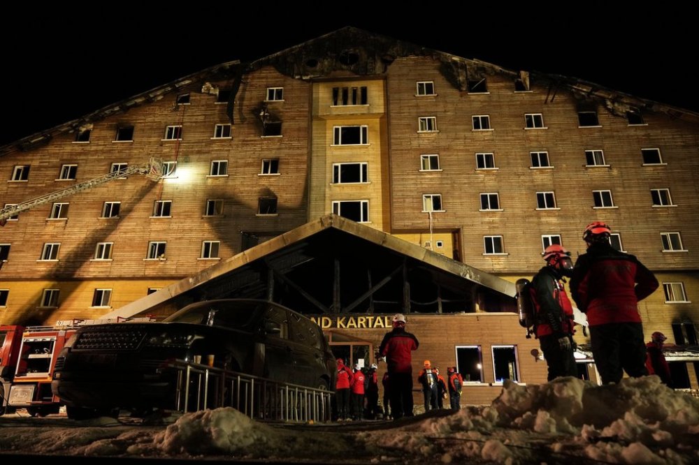 FILE - Firefighters and emergency teams work after a fire that broke out at a hotel in the ski resort of Kartalkaya, located in Bolu province, northwest Turkey, on Jan. 21, 2025. (AP Photo/Francisco Seco, File)