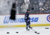 Winnipeg Jets' Kyle Connor (81) celebrates his hat trick against the Dallas Stars during third period NHL action in Winnipeg on Thursday, October 9, 2025. THE CANADIAN PRESS/John Woods