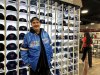 Michael Greer stands in front of a wall of Toronto Blue Jays hats at the Eaton Centre, in Toronto, on Wednesday, Oct. 22, 2025. THE CANADIAN PRESS/Hannah Alberga