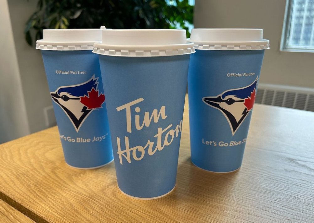 Tim Hortons' hot beverage cups blue and emblazoning them with a Jays logo are shown in Toronto on Friday Nov. 31, 2025.
THE CANADIAN PRESS/Staff