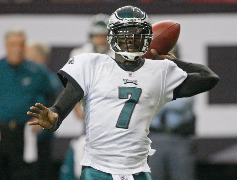 FILE - Philadelphia Eagles quarterback Michael Vick throws in the first quarter during an NFL football game against the Atlanta Falcons, Dec. 6, 2009 in Atlanta. (AP Photo/John Bazemore, file)