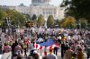 Crowds gather for a No Kings protest, Saturday, Oct. 18, 2025, in Washington. (AP Photo/Allison Robbert)