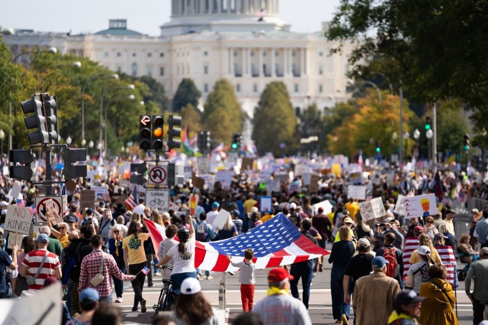 Crowds gather for a No Kings protest, Saturday, Oct. 18, 2025, in Washington. (AP Photo/Allison Robbert)