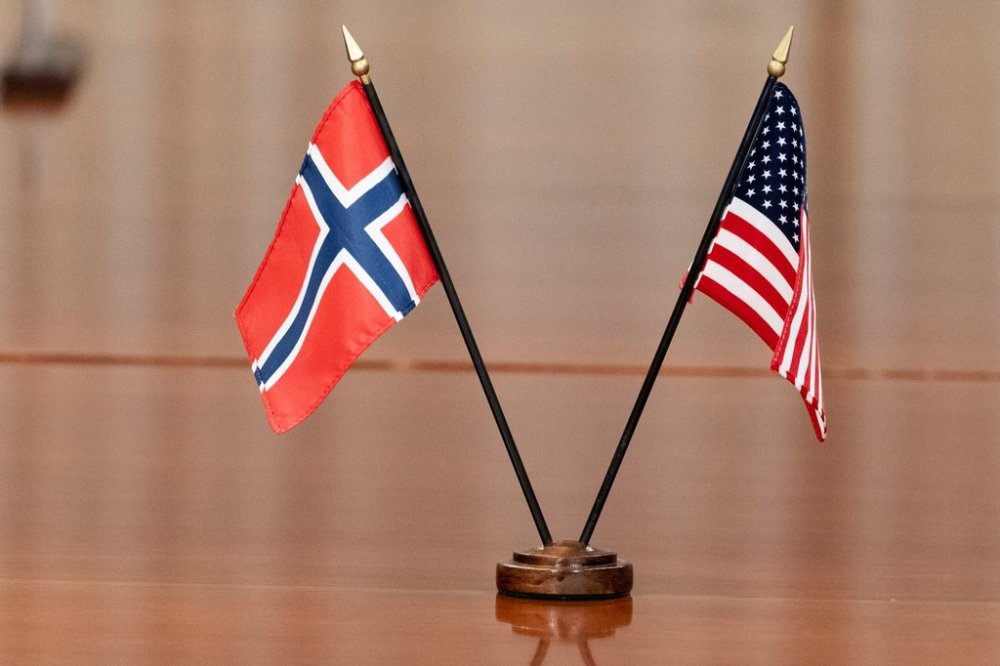 FILE - The Norway, left, and US flags are seen on the table at the Pentagon, on Sept. 20, 2022, in Washington. (AP Photo/Alex Brandon, File)