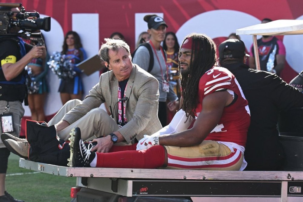 San Francisco 49ers middle linebacker Fred Warner is carted off the field during the first half of an NFL football game against the Tampa Bay Buccaneers in Tampa, Fla., Sunday, Oct. 12, 2025. (AP Photo/Jason Behnken)