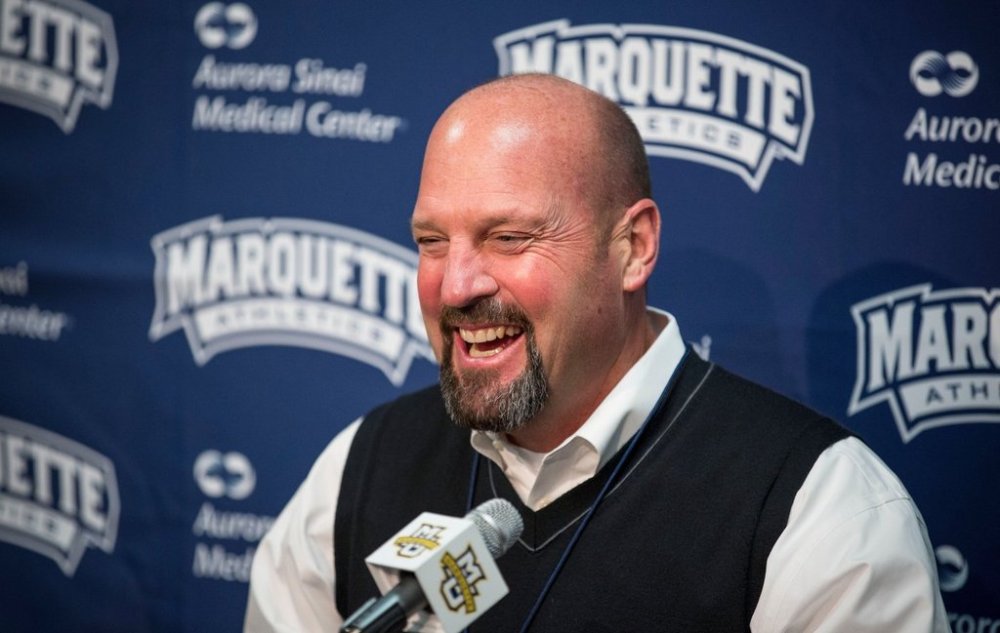 FILE - Marquette athletic director Larry Williams reacts during a news conference after this team played Savannah State in an NCAA college basketball game Dec. 15, 2012, in Milwaukee. (AP Photo/Tom Lynn, File)