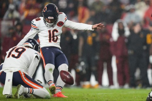 Chicago Bears kicker Jake Moody (16) kicks the game-winning field goal off the hold by punter Tory Taylor as time expires in an NFL football game against the Washington Commanders, Monday, Oct. 13, 2025, in Landover, Md. (AP Photo/Stephanie Scarbrough)