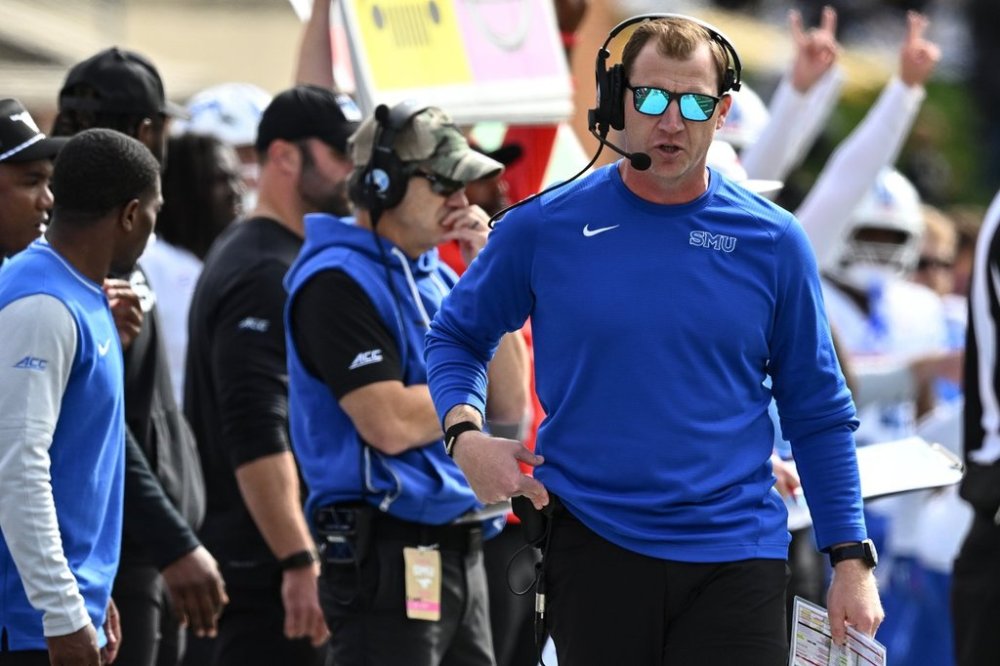 SMU head coach Rhett Lashlee looks on during the first half of an NCAA college football game against Wake Forest, Saturday, Oct. 25, 2025, in Winston-Salem, N.C. (AP Photo/Matt Kelley)