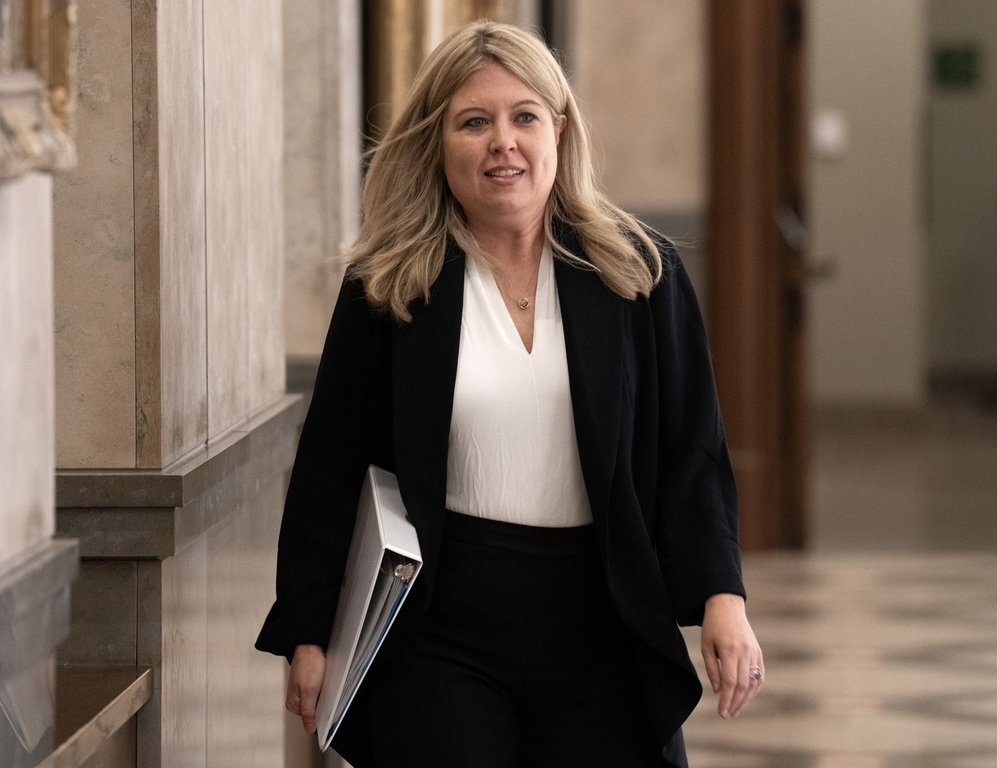 Conservative MP Michelle Rempel Garner makes her way to speak with media in the foyer of the House of Commons, Thursday, September 12, 2024, in Ottawa. THE CANADIAN PRESS/Adrian Wyld