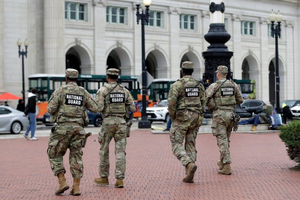 National Guard soldiers patrol at Union Station, Tuesday, Oct. 28, 2025, in Washington. (AP Photo/Rahmat Gul)