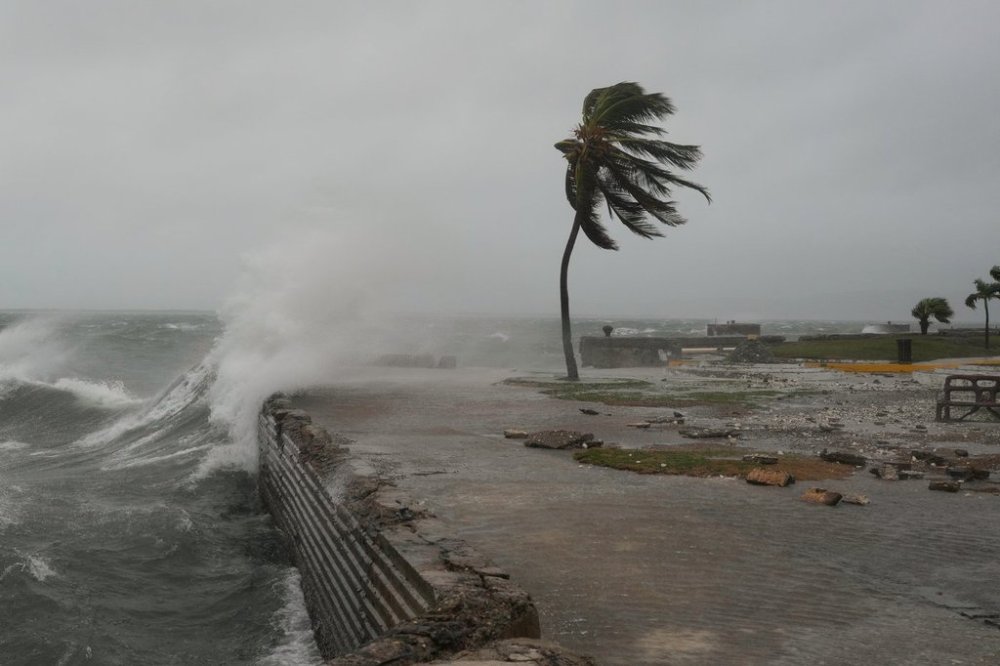 Waves splash in Kingston, Jamaica, as Hurricane Melissa approaches, Tuesday, Oct. 28, 2025. (AP Photo/Matias Delacroix)