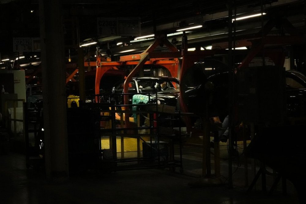 Cars pass along the assembly line at the Stellantis plant in Brampton, Ontario on Friday July 21, 2023. THE CANADIAN PRESS/Chris Young