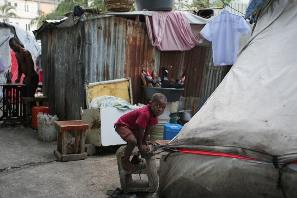 A child plays at a shelter for families displaced by gang violence in Port-au-Prince, Haiti, Thursday, Oct. 16, 2025. (AP Photo/Odelyn Joseph)