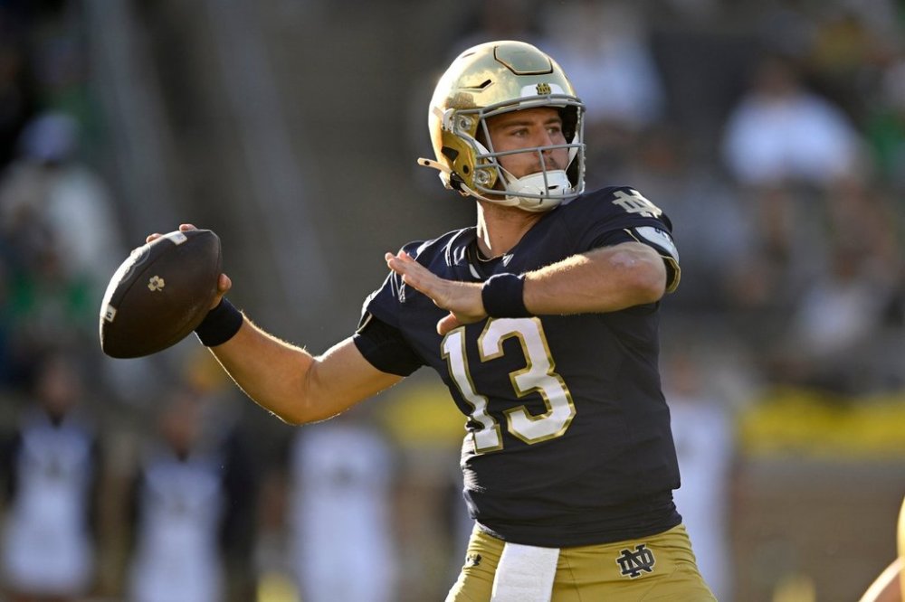 Notre Dame quarterback CJ Carr looks to throw during the third quarter of an NCAA college football game against North Carolina State, Saturday, Oct. 11, 2025, in South Bend, Ind. (AP Photo/Paul Beaty)