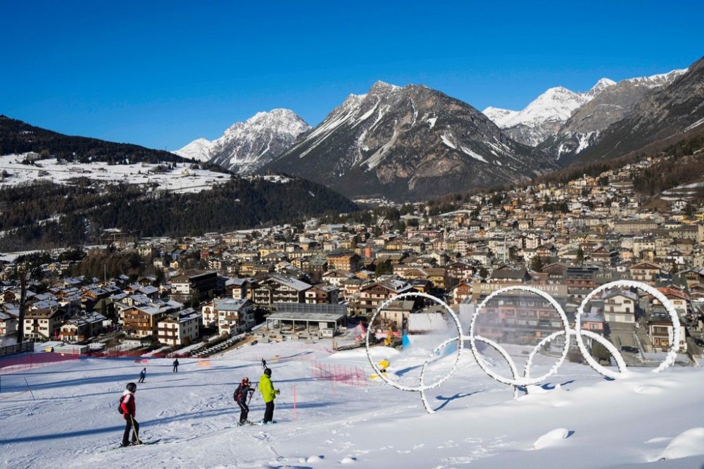 FILE - Olympic rings are seen near a slope of the Stelvio Ski Center, venue for the alpine ski and ski mountaineering disciplines at the Milan Cortina 2026 Winter Olympics, in Bormio, Italy, Thursday, Jan. 16, 2025. (AP Photo/Luca Bruno, File)