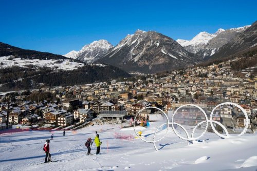 FILE - Olympic rings are seen near a slope of the Stelvio Ski Center, venue for the alpine ski and ski mountaineering disciplines at the Milan Cortina 2026 Winter Olympics, in Bormio, Italy, Thursday, Jan. 16, 2025. (AP Photo/Luca Bruno, File)