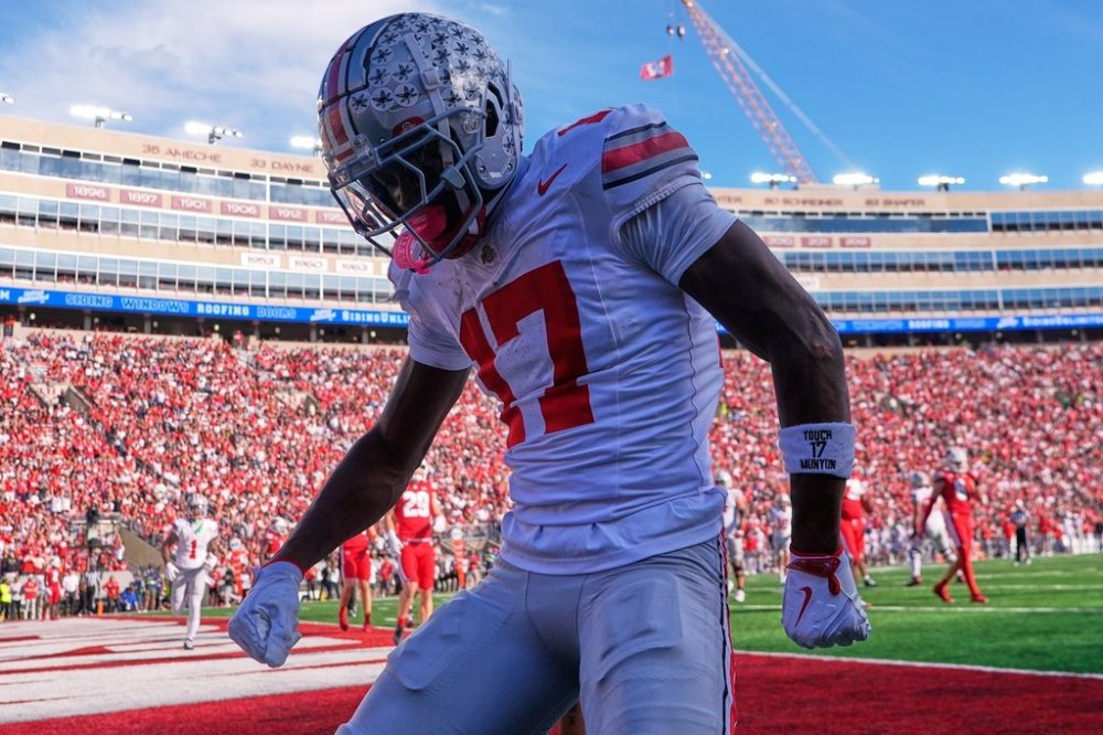 Ohio State's Carnell Tate celebrates his touchdown catch during the first half of an NCAA college football game against the Wisconsin Saturday, Oct. 18, 2025, in Madison, Wis. (AP Photo/Morry Gash)