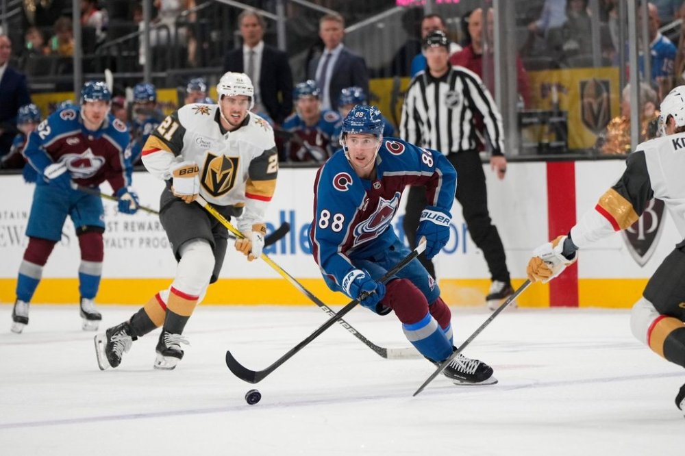 Colorado Avalanche center Martin Necas (88) skates with the puck during the first period of an NHL hockey game against the Vegas Golden Knights, Friday, Oct. 31, 2025, in Las Vegas. (AP Photo/Lucas Peltier)