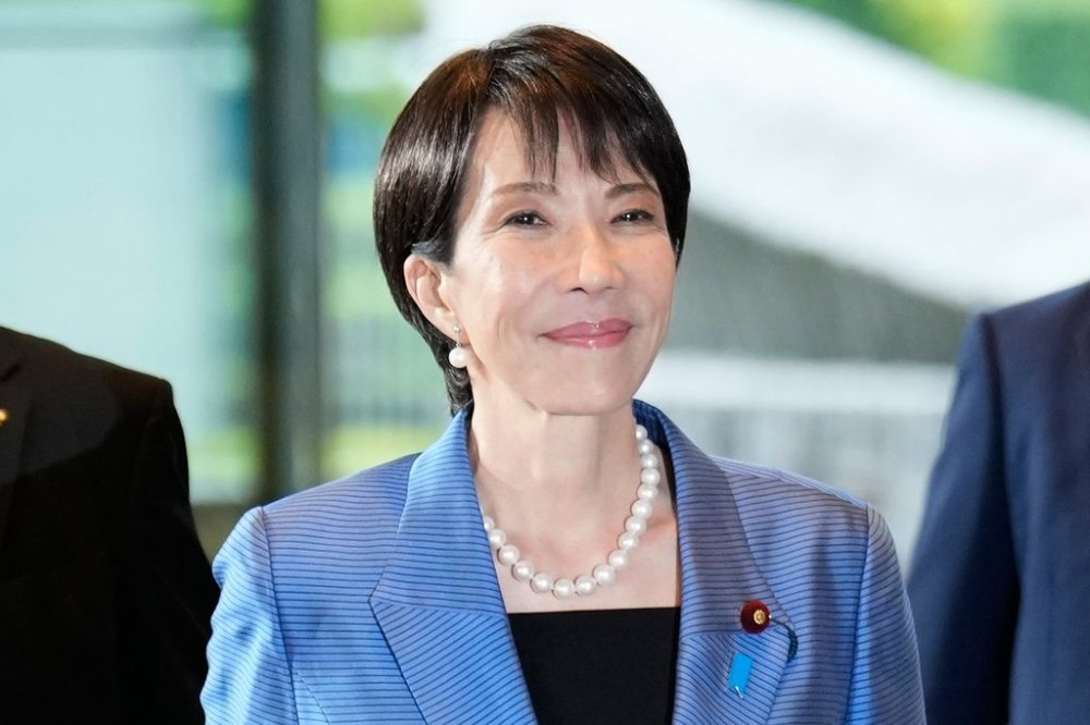 Newly elected Prime Minister Sanae Takaichi arrives at the prime minister's office in Tokyo, Japan, Tuesday, Oct. 21, 2025. (AP Photo/Eugene Hoshiko)