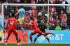 Philadelphia Union's Tai Baribo (9) scores a goal against Chicago Fire goalie Jeffrey Gal during the first half of an MLS soccer playoff match Saturday, Nov. 1, 2025, in Bridgeview, Ill. (AP Photo/Paul Beaty)