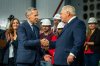 Prime Minister Mark Carney, left, shakes hands with Ontario Premier Doug Ford after the two made an announcement at the Darlington Energy Complex in Courtice, Ont., on Thursday, October 23, 2025. THE CANADIAN PRESS/Laura Proctor
