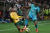 Rwanda's Claude Niyomugabo, right, stops South Africa's Thapelo Morena during a World Cup 2026 group C qualifying soccer match between South Africa and Rwanda at Mbombela Stadium, in Nelspruit, South Africa, Tuesday, Oct. 14, 2025. (AP Photo/Alfonso Nqunjana)