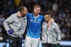 Napoli's Kevin De Bruyne leaves the pitch injured during the Italian Serie A soccer match between Napoli and Inter Milan, in Naples, Italy, Saturday, Oct. 25, 2025. (Alessandro Garofalo/LaPresse via AP)