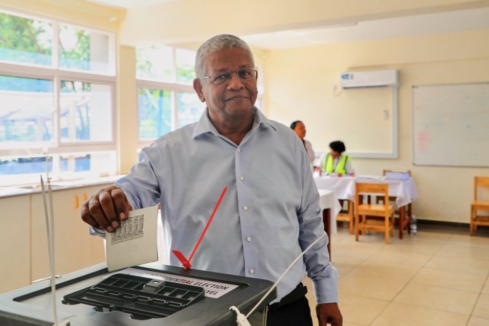 President Wavel Ramkalawan casts his vote in a runoff presidential election between him and opposition challenger Patrick Herminie, at Belonie Secondary School in St Louis, Mahe, Seychelles, Saturday, Oct. 11, 2025. (AP Photo/Emilie Chetty)