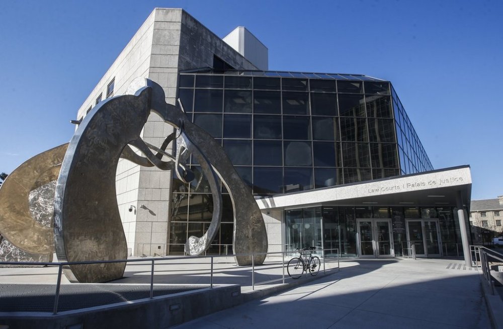 A youth who was 15-years-old when he violently attacked three vulnerable people resulting in their deaths has been handed a life sentence in prison. The Manitoba Law Courts building in Winnipeg on Wednesday, May 8, 2024. THE CANADIAN PRESS/John Woods