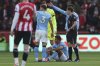 Manchester City's Rodri on the floor, before being taken off as injured, during the English Premier League soccer match between Brentford and Manchester City at the Gtech Community Stadium, Brentford, England, Sunday Oct. 5, 2025. (Steven Paston/PA via AP)