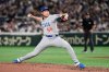 FILE - Chicago Cubs relief pitcher Nate Pearson throws to the Los Angeles Dodgers in the fifth inning of an MLB Tokyo Series baseball game in Tokyo, Japan, Wednesday, March 19, 2025. (AP Photo/Eugene Hoshiko, File)