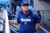 Toronto Blue Jays bench coach Don Mattingly surveys the crowd ahead of first inning Game 4 World Series playoff MLB baseball action against the Los Angeles Dodgers in Los Angeles on Tuesday, Oct. 28, 2025. THE CANADIAN PRESS/Frank Gunn
