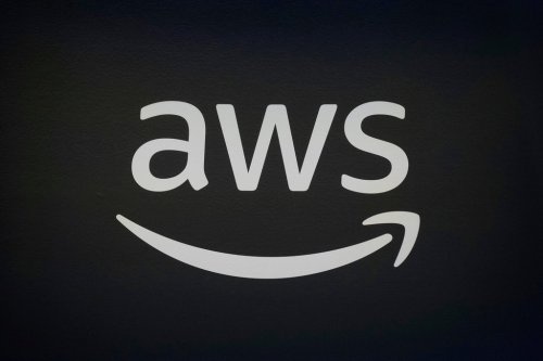 An AWS, Amazon Web Services, logo is displayed at LlamaCon 2025, an AI developer conference, in Menlo Park, Calif., Tuesday, April 29, 2025. (AP Photo/Jeff Chiu, File)