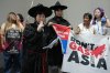 Activists participate in a demonstration calling for South Korea to stop funding fossil fuels during a Don't Gas Asia protest at the COP30 U.N. Climate Summit, Monday, Nov. 17, 2025, in Belem, Brazil. (AP Photo/Andre Penner)