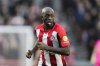 FILE - Yoane Wissa of Brentford chases the ball during the English Premier League soccer match between Brentford and Aston Villa, at the Gtech Community Stadium in London, Dec. 17, 2023. (AP Photo/Dave Shopland, File)