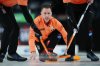 Brad Gushue throws a rock against Team Epping during Canadian Olympic curling trials action in Halifax, Monday, Nov. 24, 2025. THE CANADIAN PRESS/Darren Calabrese